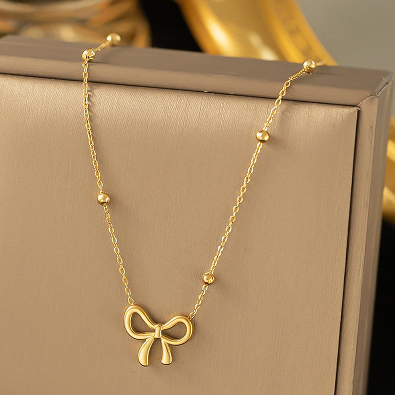 Lakshmira Gold Plated Anti Tarnish Bow Themed Necklace Set