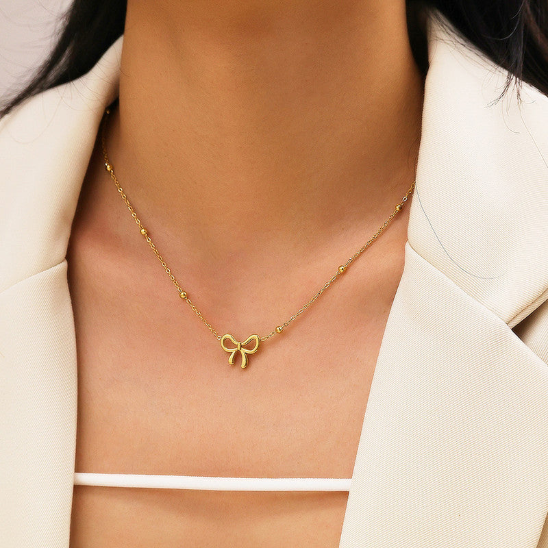 Lakshmira Gold Plated Anti Tarnish Bow Themed Necklace Set