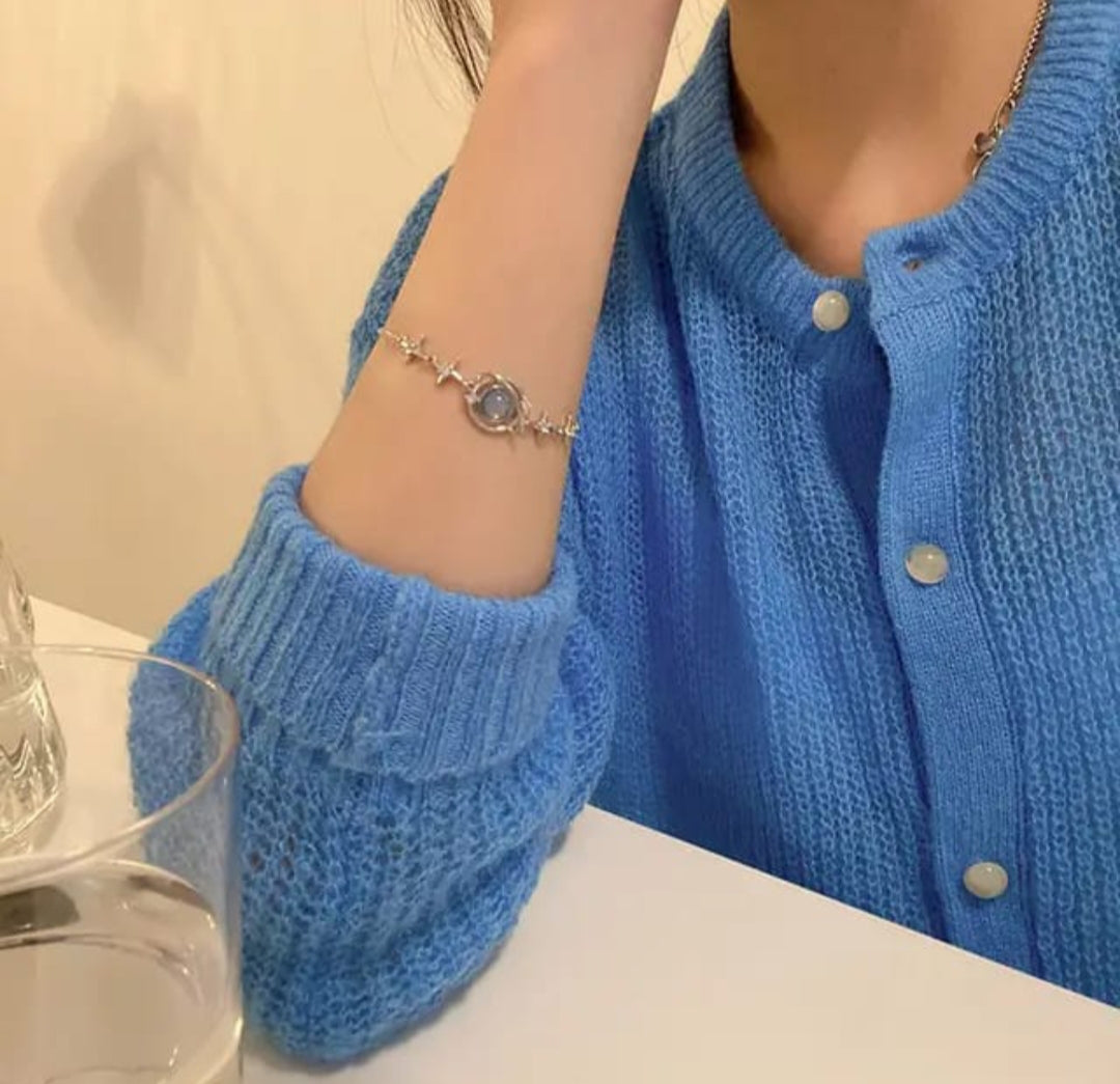 Lakshmira Blue Stone Korean Bracelet worn on a model’s wrist, showcasing the adjustable fit and elegant design