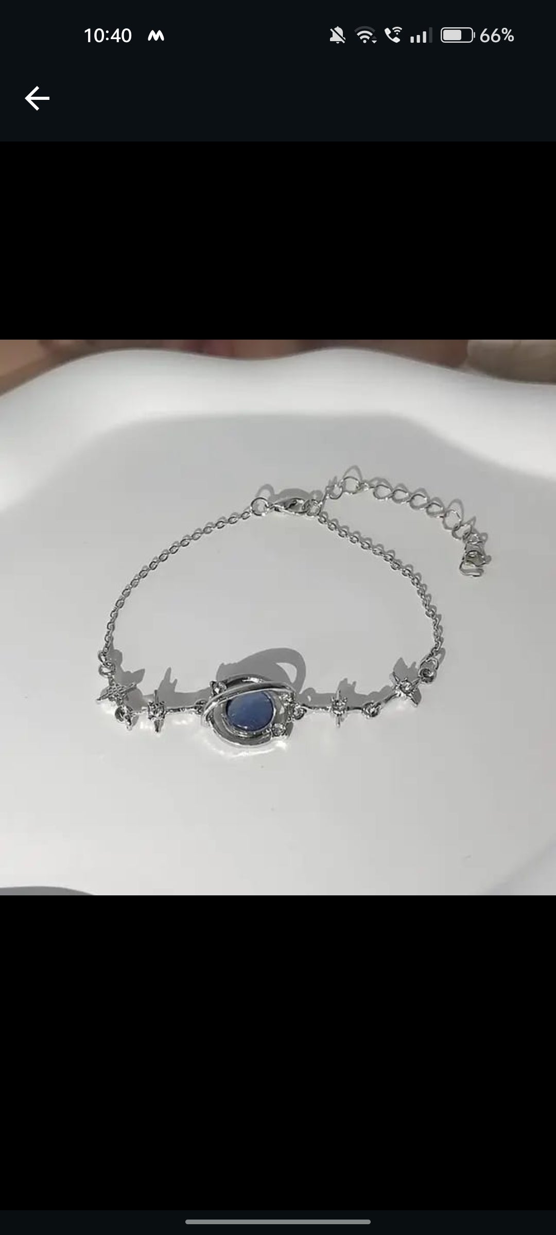 Stylish Lakshmira Blue Stone Korean Bracelet displayed on a white background, highlighting the silver and blue colors